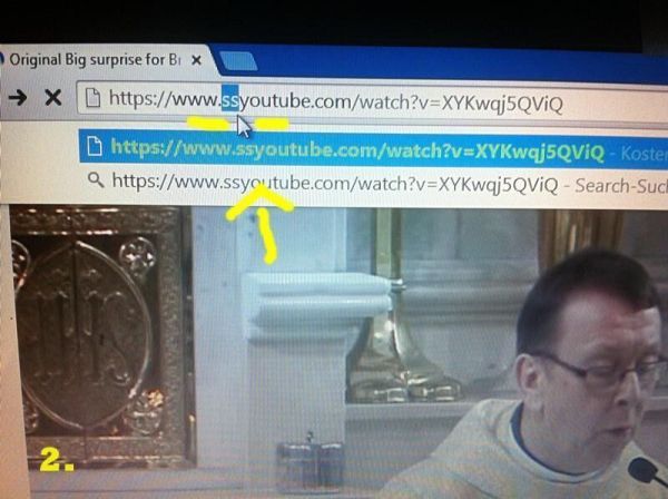 Ein Browserfenster zeigt eine YouTube-URL, während eine Person spricht. Der Fokus liegt auf dem Link und dem Herunterladen von Videos.
