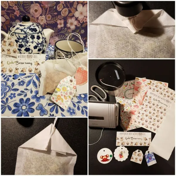 Hübsche Teebeutel liegen auf einem bunten Tisch, umgeben von Teekanne, Tassen und dekorativen Etiketten.
