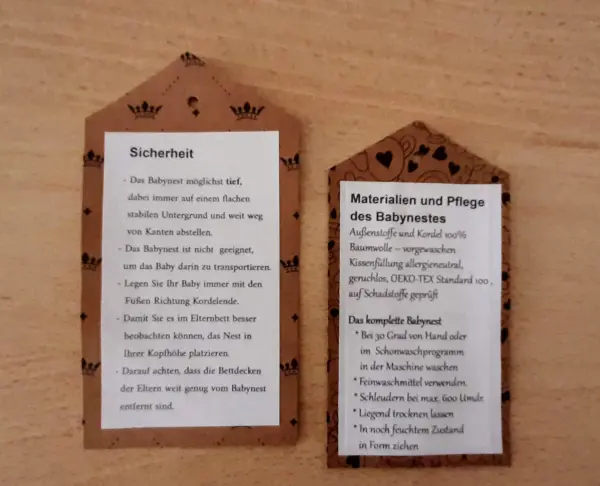 Auf braunen Kärtchen stehen Anleitungen und Tipps zum Babynest nähen, um Sicherheit und Pflege zu gewährleisten.