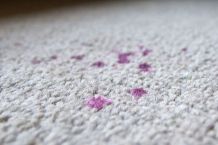 Wachsflecken entfernen mit Löschpapier und Bügeleisen