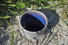 Sonnenschirmhalter vor Wasser/Rost schützen: mit einem Korken
