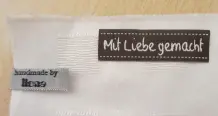 Namensetiketten unterstreichen ein Unikat