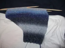 Socken oder Hüttenschuhe ohne komplizierte Ferse stricken