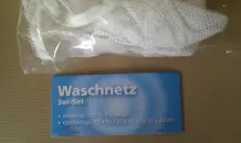 Gardinen mit Röllchen im Wäschenetz waschen
