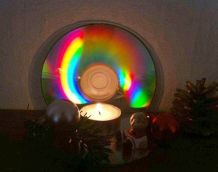 Lichterspiel aus alten CDs mit Teelicht