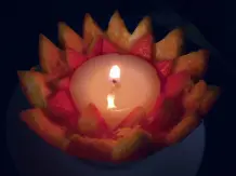 Öllampe in Orangenschale