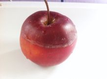 Früchte von Wachs befreien