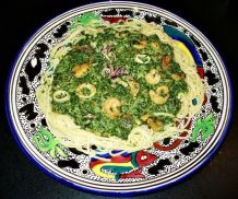 Meeresfrüchte mit Spinat auf Spaghetti