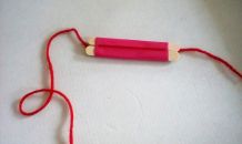Hilfsmittel um Pompons herzustellen