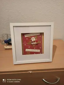 Selbst gestalteter Bilderrahmen als Mitbringsel in der Adventszeit