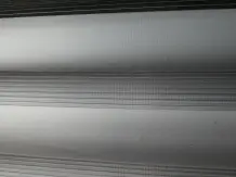 Verschmutzes Doppelrollo (Duorollo) kürzen