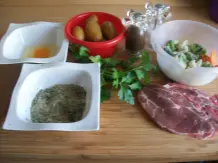 Würziges Kotelett mit Kräuter-Panade