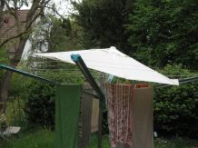 Ein Schirm für die Wäschespinne - Wäsche vor Regen schützen