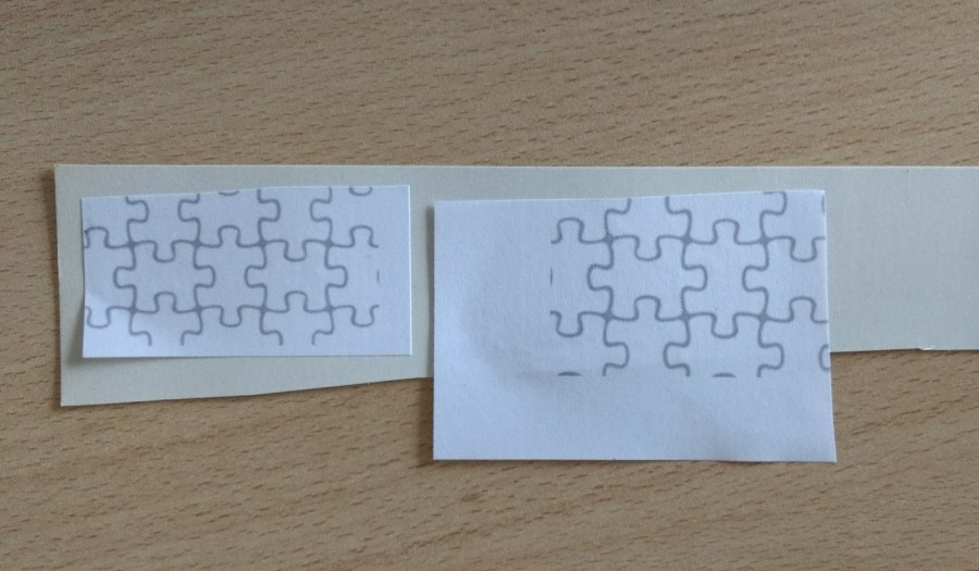 Puzzleteile in unterschiedlicher Größe drucken, auf einen zunächst beliebig gewählten Karton kleben und so das Probe-Ausschneiden vorbereiten.