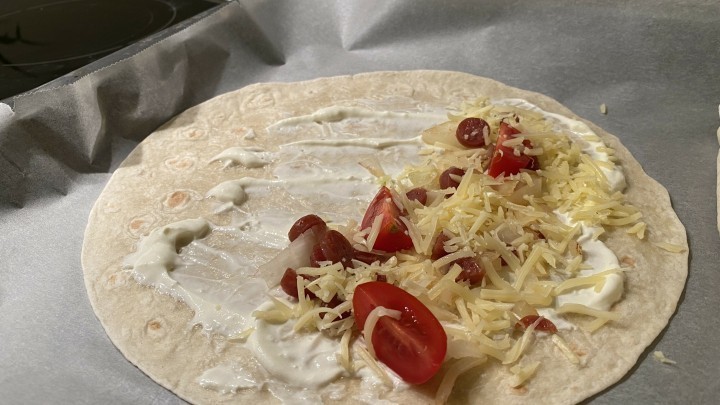 Tortilla-Wraps mit Speck und Käse aus dem Ofen - Rezept | Frag Mutti