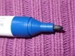 Permanentmarker auf Kleidung
