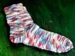 Socken stricken: Mit zwei Nadelspielen zwei Socken parallel stricken