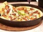 Tiefgefrorene Pizza aus der Pfanne