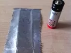 Feuer machen mit Batterie und Kaugummipapier