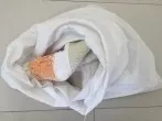 Badezimmermatten im Kissenüberzug waschen