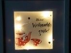 Selbst gestalteter Bilderrahmen als Mitbringsel in der Adventszeit