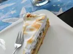 Stachelbeerkuchen mit flambierter Schaumdecke