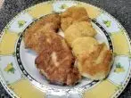 Kartoffelpuffer aus Kloßteig mit Schnitzel