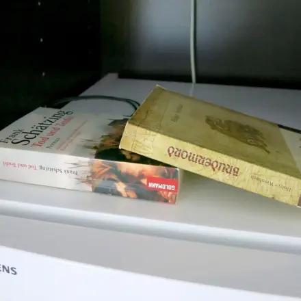 Mit Büchern Kühlgeräte auf Isolation testen