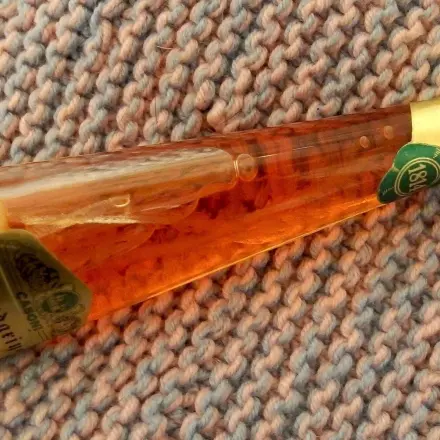 Warmes Tuch mit Schnaps gegen Ohrenschmerzen