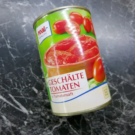 Dosentomaten schnell zerkleinern mit dem Kartoffelstampfer
