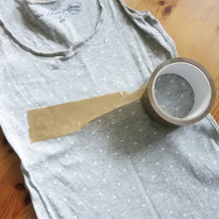 Schwarze Fusseln entfernen