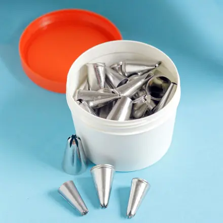 Bunte runde feste Plastikdosen mit Schraubdeckel