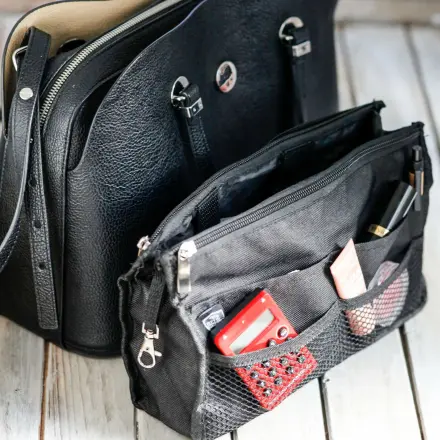 Blitzschnell, ohne Aufwand die Handtasche wechseln