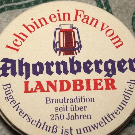 Creme im Wasserbad schlagen - Bierdeckel auf dem Topfboden