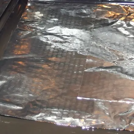 Backofen mit Alufolie auslegen
