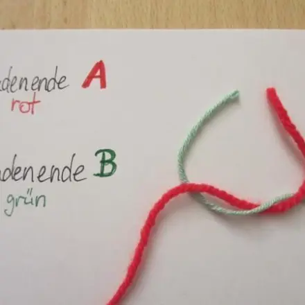 Faden vernähen mitten im Gestrick