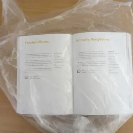 Kochbuch vor Spritzern schützen