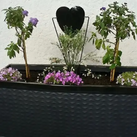 Auflagenbox für Gartenpolster als Pflanzcontainer nutzen