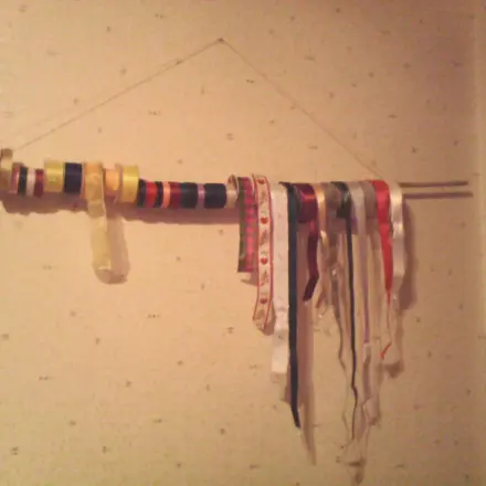 Schleifenbänder platzsparend und dekorativ aufbewahren