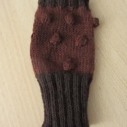 Anordnung von Strukturen/Mustern auf Strickhandschuhen