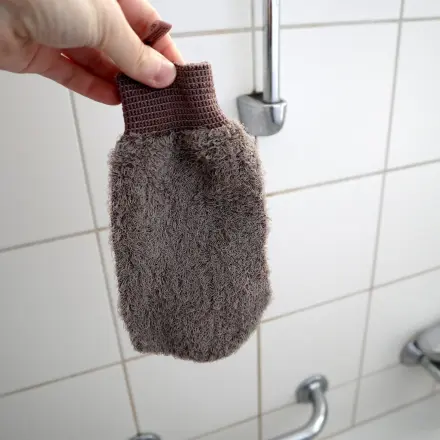 Babyweiche Haut mit Peelinghandschuh