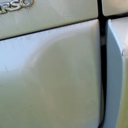 Große Dellen aus dem Auto notdürftig rausziehen