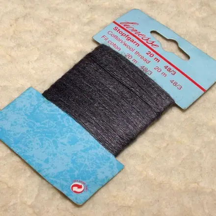 Knöpfe fest und elastisch annähen mit Stopfgarn