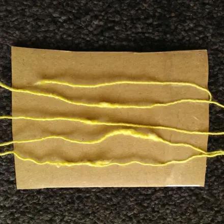 Flusen auf Seidengarn harmlos!