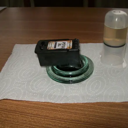 Druckerpatrone mit integriertem Druckkopf reinigen