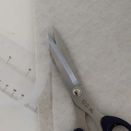 Aufgebügeltes Volumenvlies leicht wieder entfernen