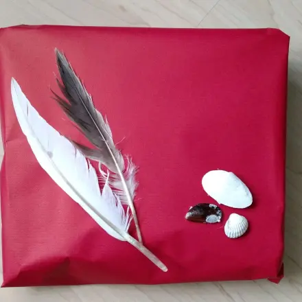 Urlaubs-Mitbringsel nett verpacken