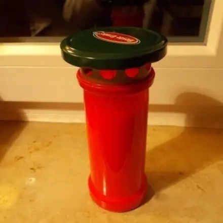 Grableuchten mit Kerze vor Nässe schützen