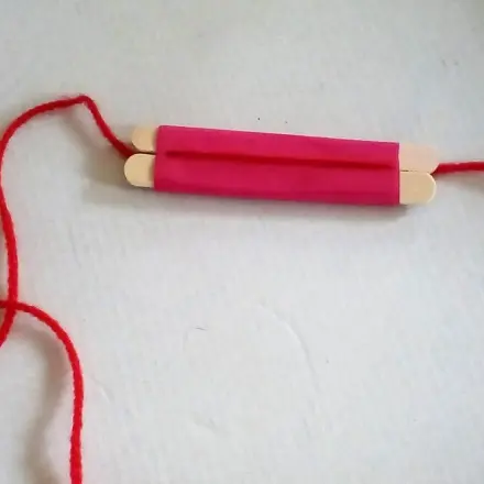 Hilfsmittel um Pompons herzustellen