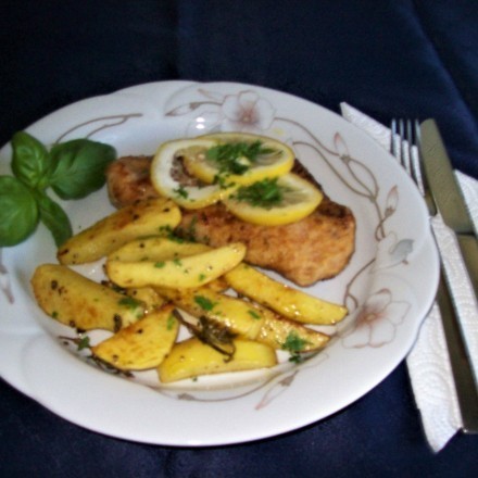Zitronenschnitzel mit gebackenen Kartoffeln